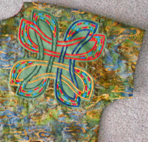 Closeup of vest back showing stitched Danu block.